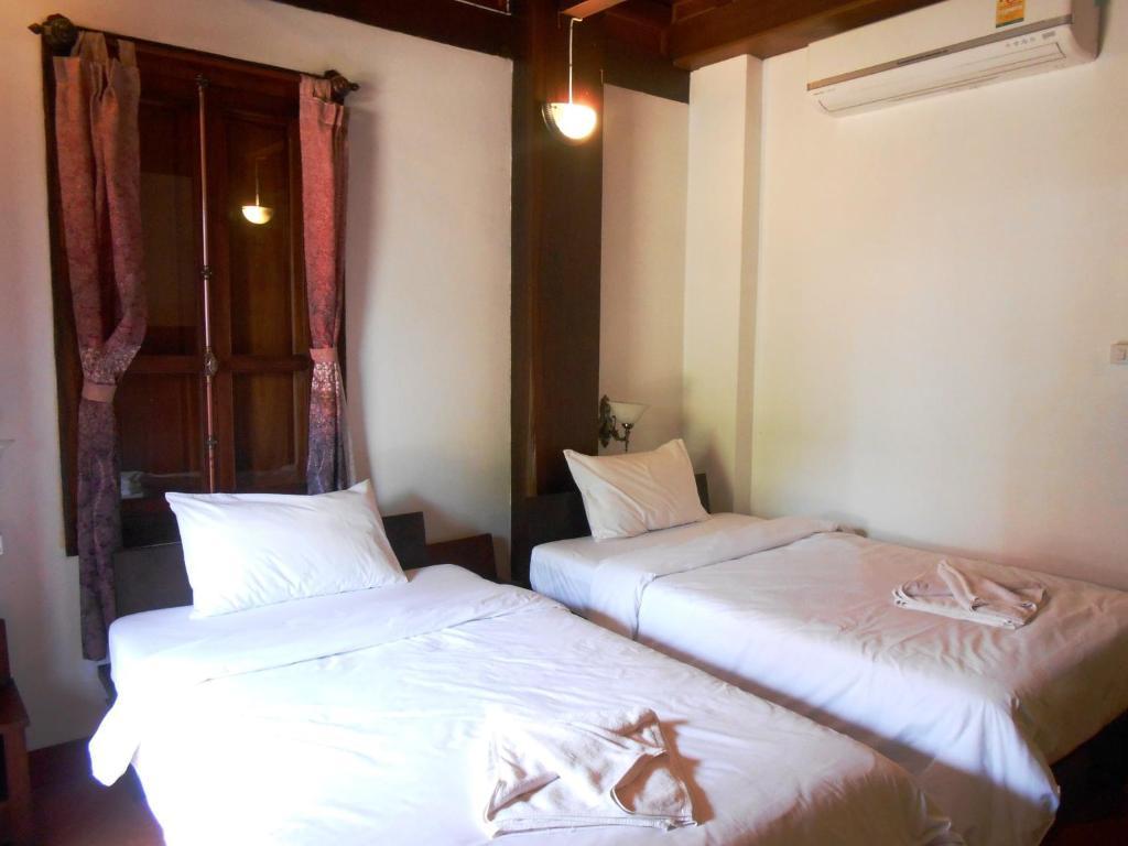 לואנג פרבאנג Lakhangthong Boutique Hotel חדר תמונה